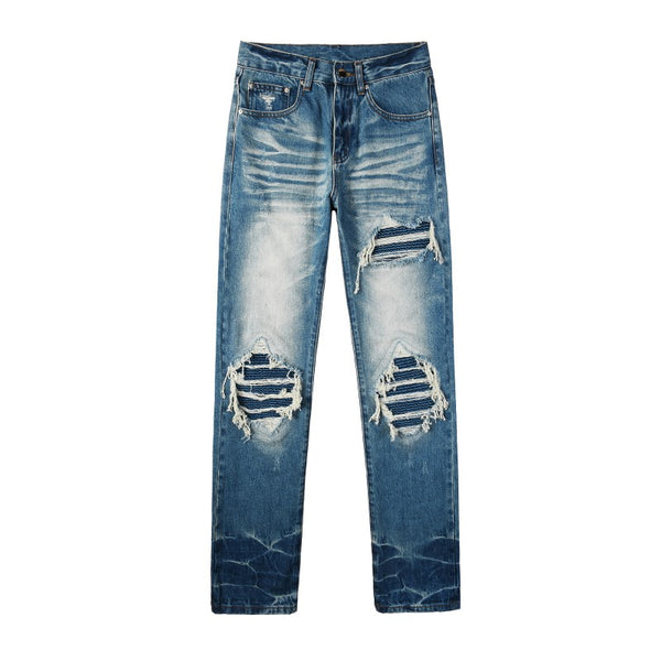 Todroki Line Break blue slim denim with knee rips – front