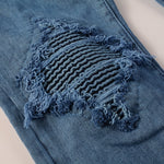 Load image into Gallery viewer, Todroki Steel Grain – shredded knee damage detail