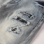 Load image into Gallery viewer, Todroki Shale Fault – slash rips with bandana-print inset