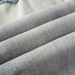 Load image into Gallery viewer, Todroki Shale Fault – denim fabric close-up