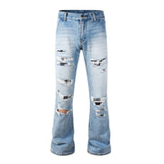 Todroki Pale Rupture light blue destroyed flare denim – front