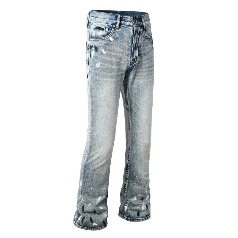 Todroki Pale Static light blue flare denim with paint splatter – front