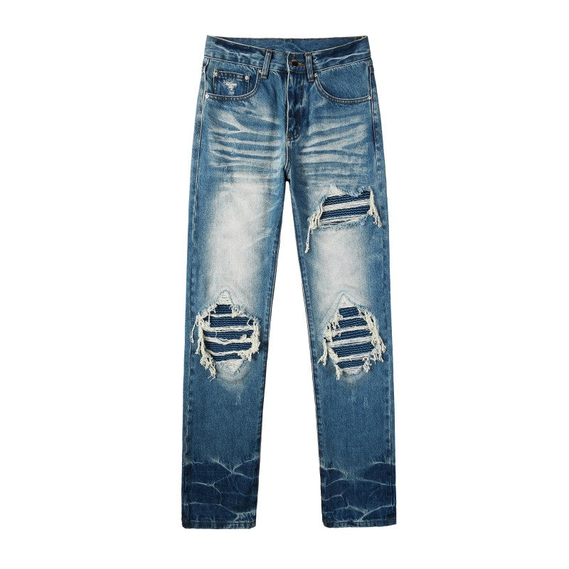 Todroki Line Break blue slim denim with knee rips – front